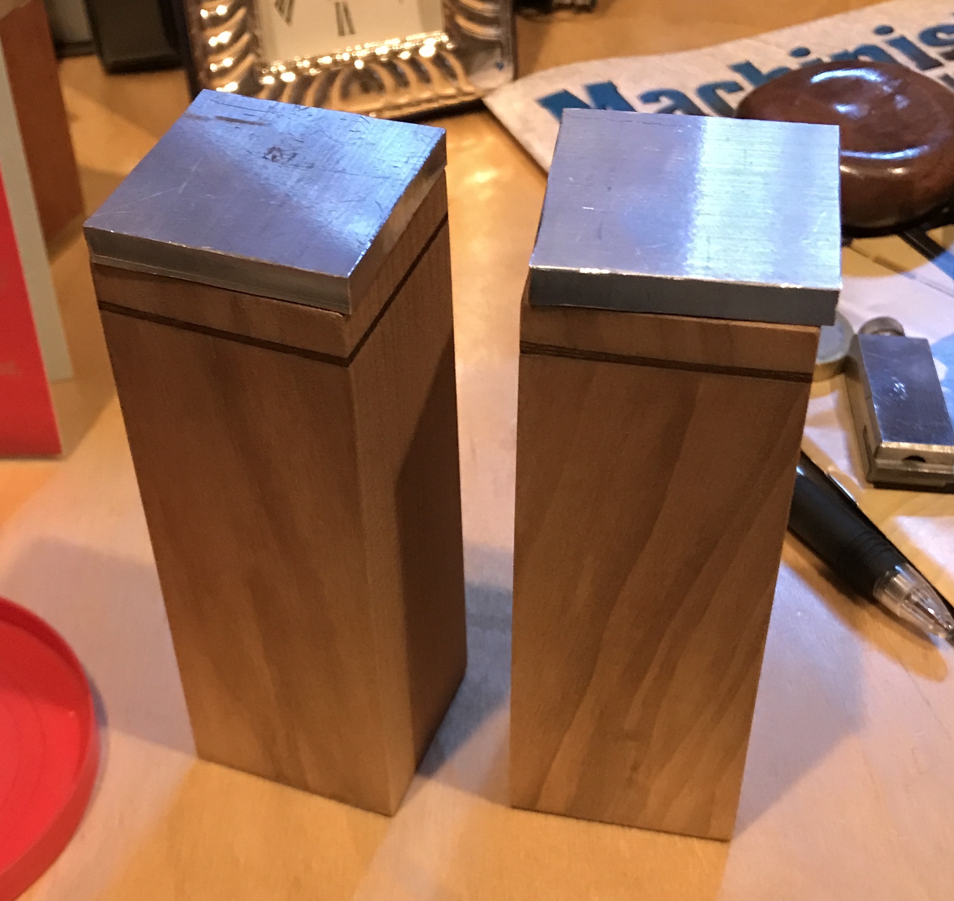 The two tops cut to fit their respective holders.